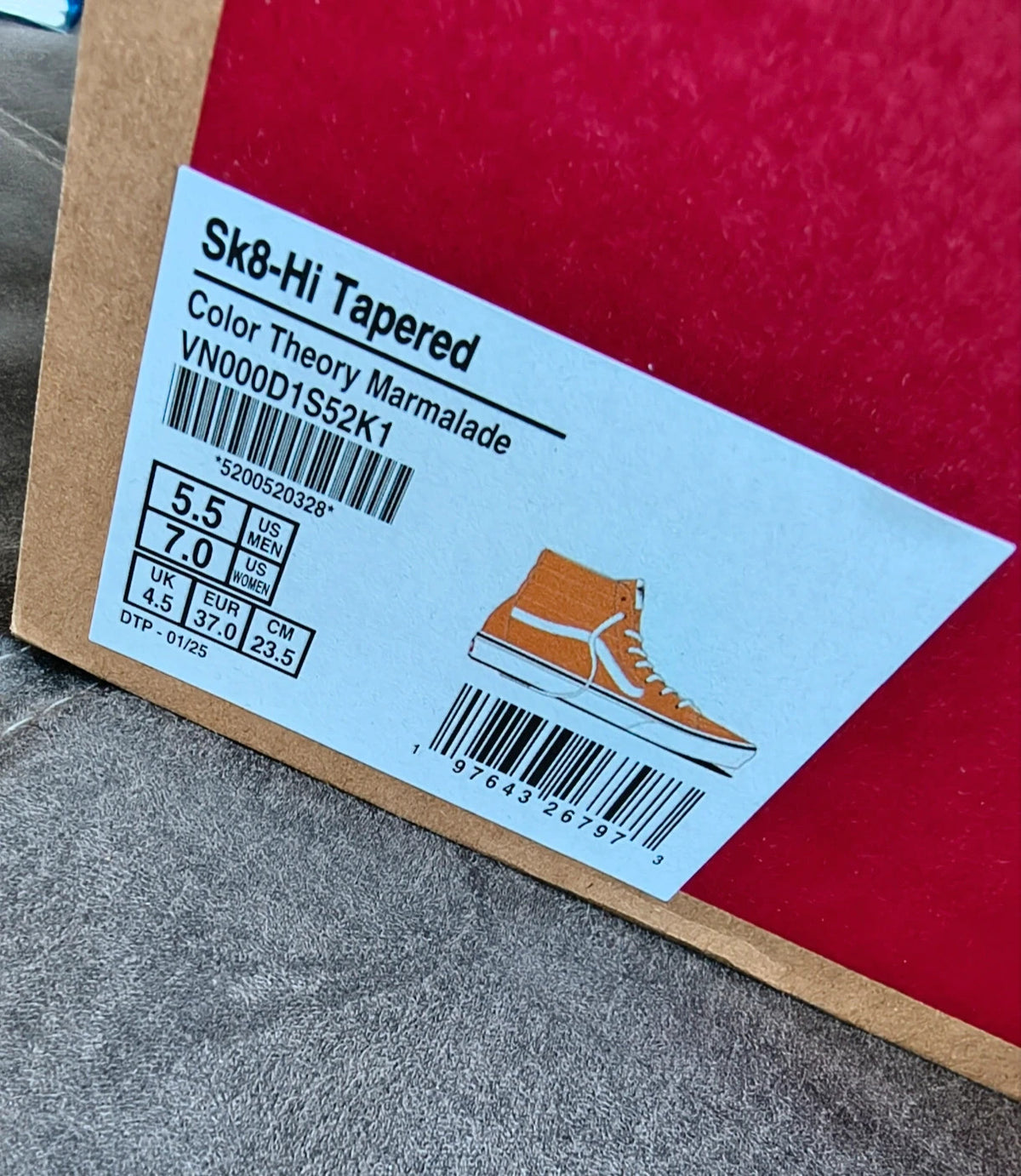 VANS Sk8-Hi Tapered trainers orange marmalade with white laces and signature side stripe.