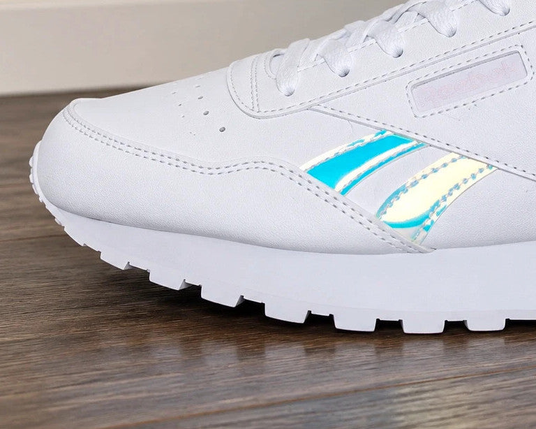 Reebok white trainers hologram details, synthetic material, classic logo design.