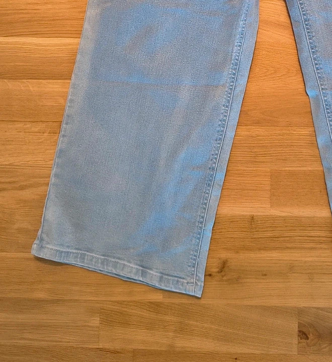 Rainbow blue straight jeans with unique overlapping waistband and two-button closure.