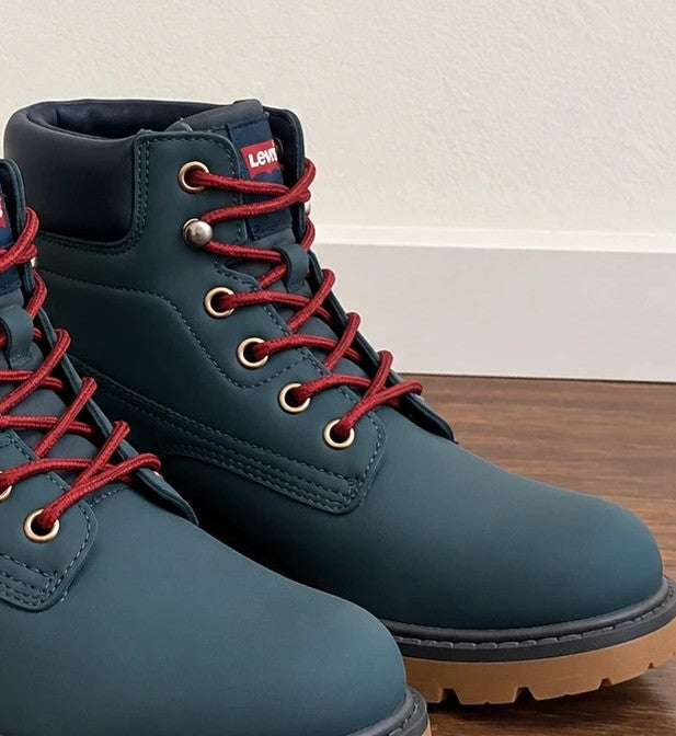 Levi's blue junior boots with contrasting laces, padded shaft, and rugged sole.