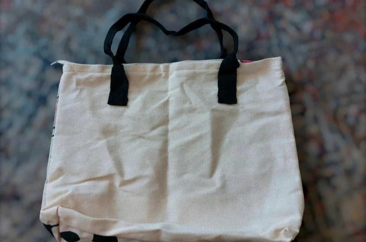 Cartoon cream shopping tote featuring Goofy design and synthetic material.