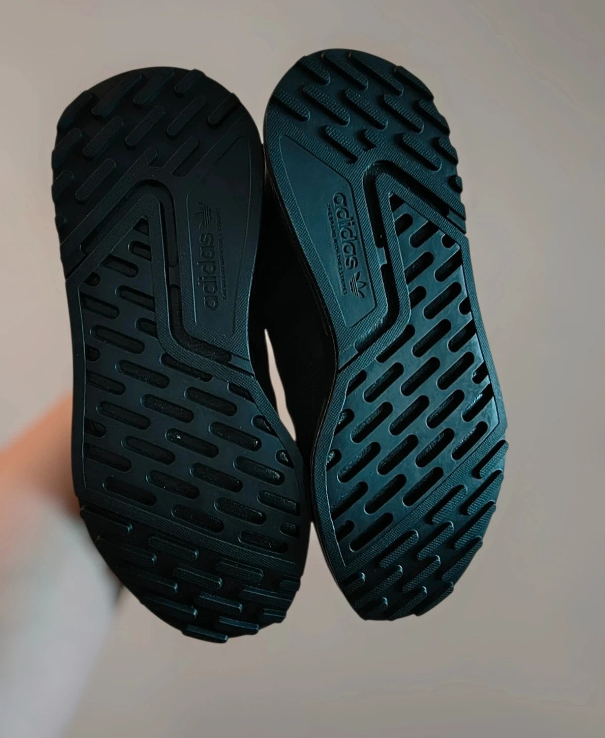 Adidas black trainers with synthetic and textile material, classic design, original box included.