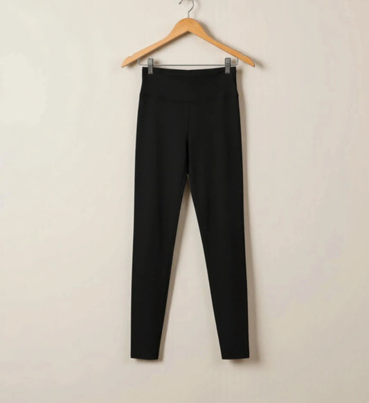 XXL black girls' leggings with ruched back for push-up effect, gently used.
