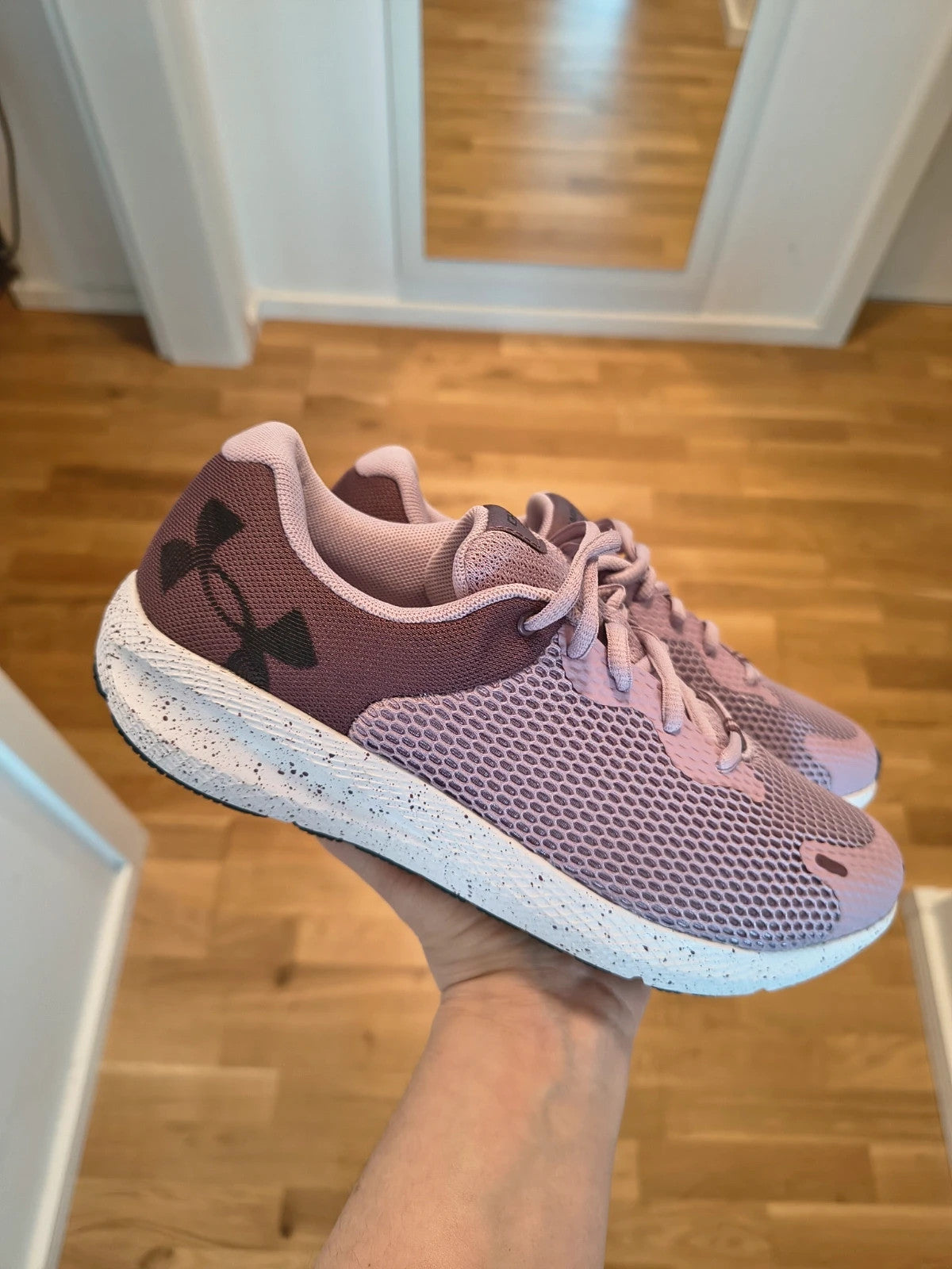 Under Armour purple trainers synthetic material with logo detail and classic design.