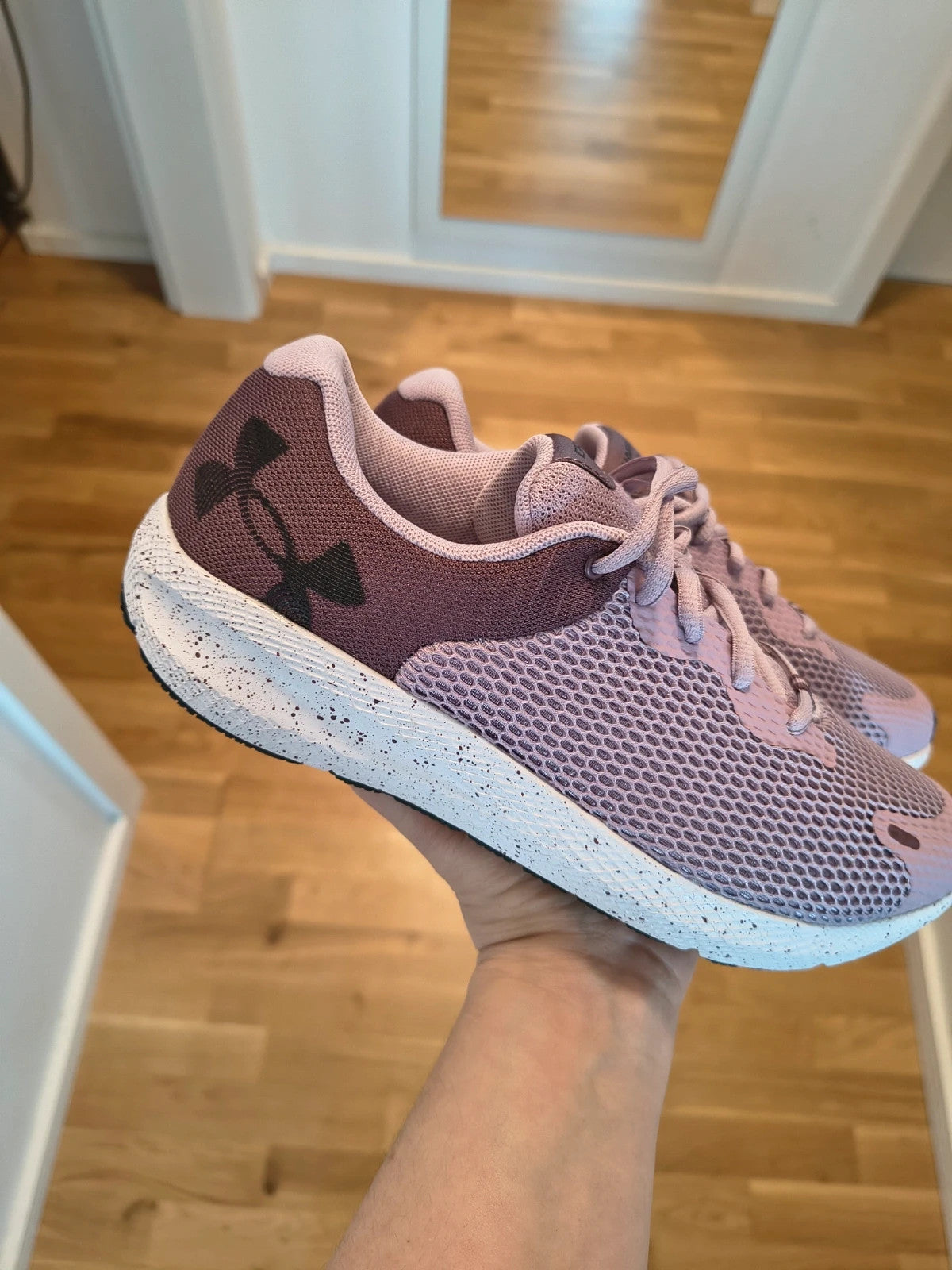 Under Armour purple trainers synthetic material with logo detail and classic design.