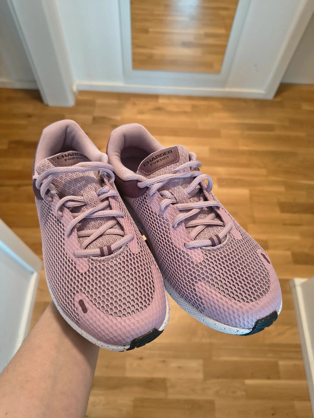 Under Armour purple trainers synthetic material with logo detail and classic design.