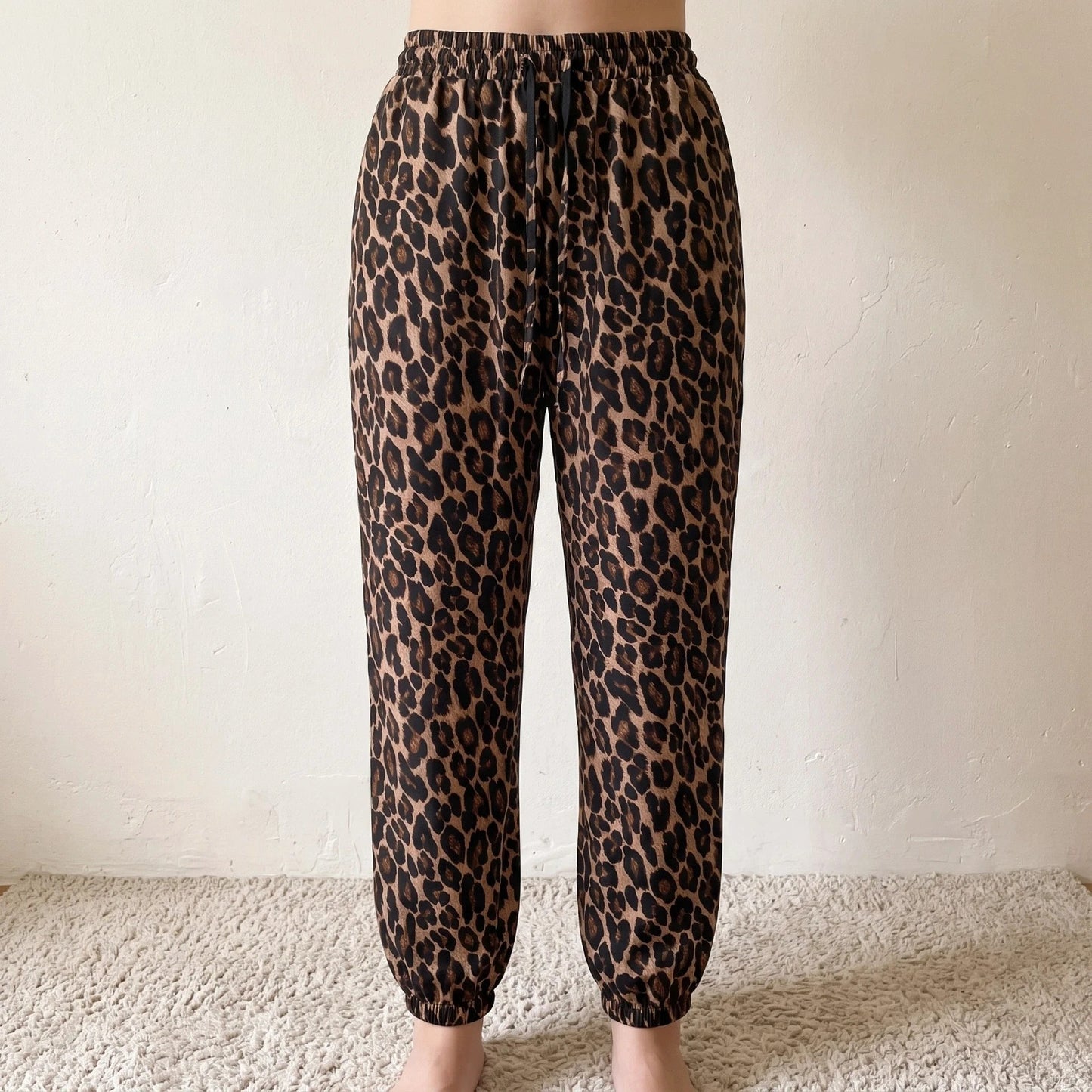SheIn joggers black and brown leopard print synthetic material with elastic waistband.