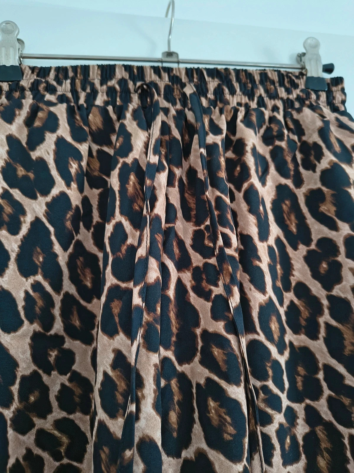 SheIn joggers black and brown leopard print synthetic material with elastic waistband.