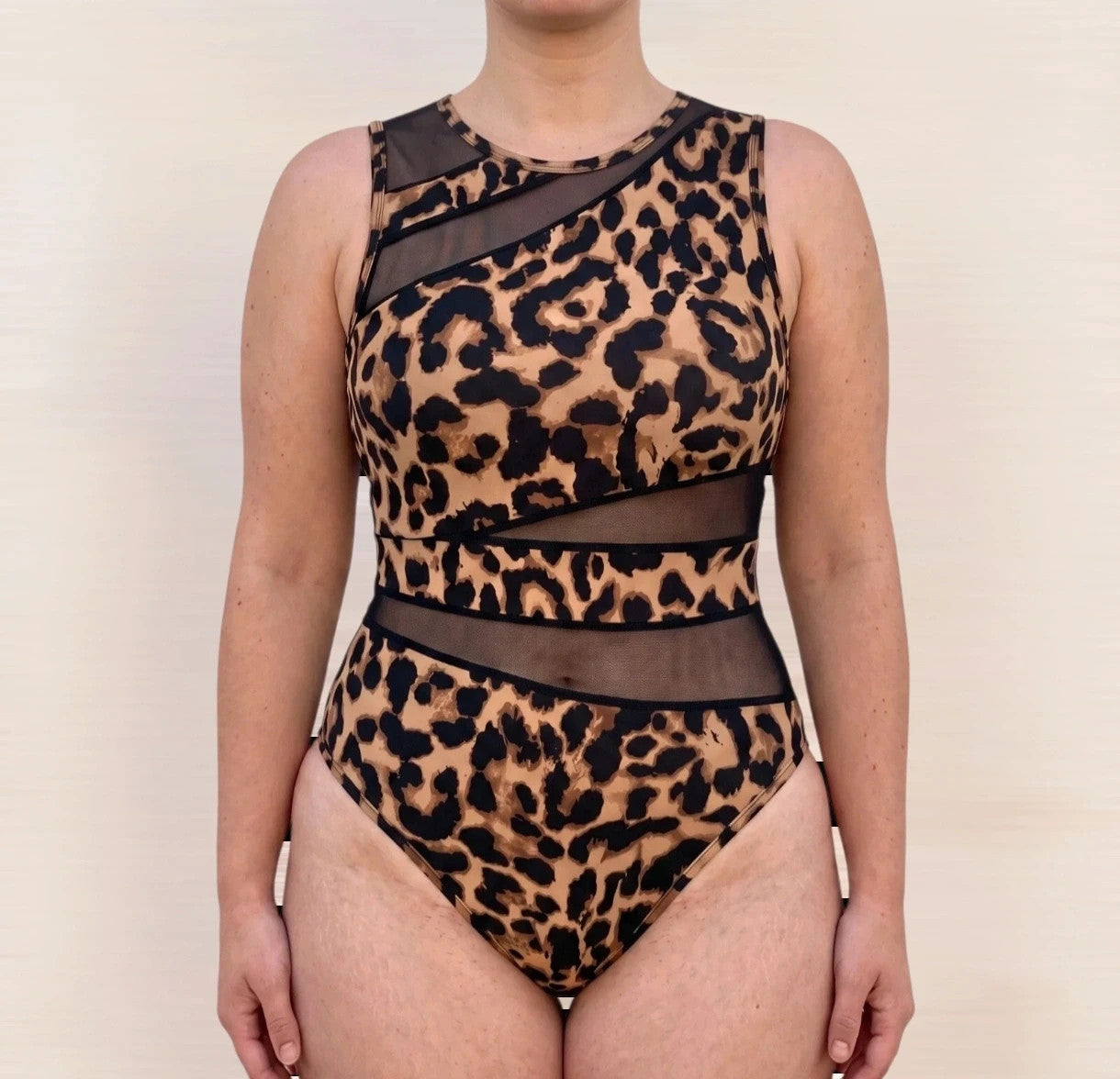 SheIn black and brown leopard print romper synthetic material with animal pattern.