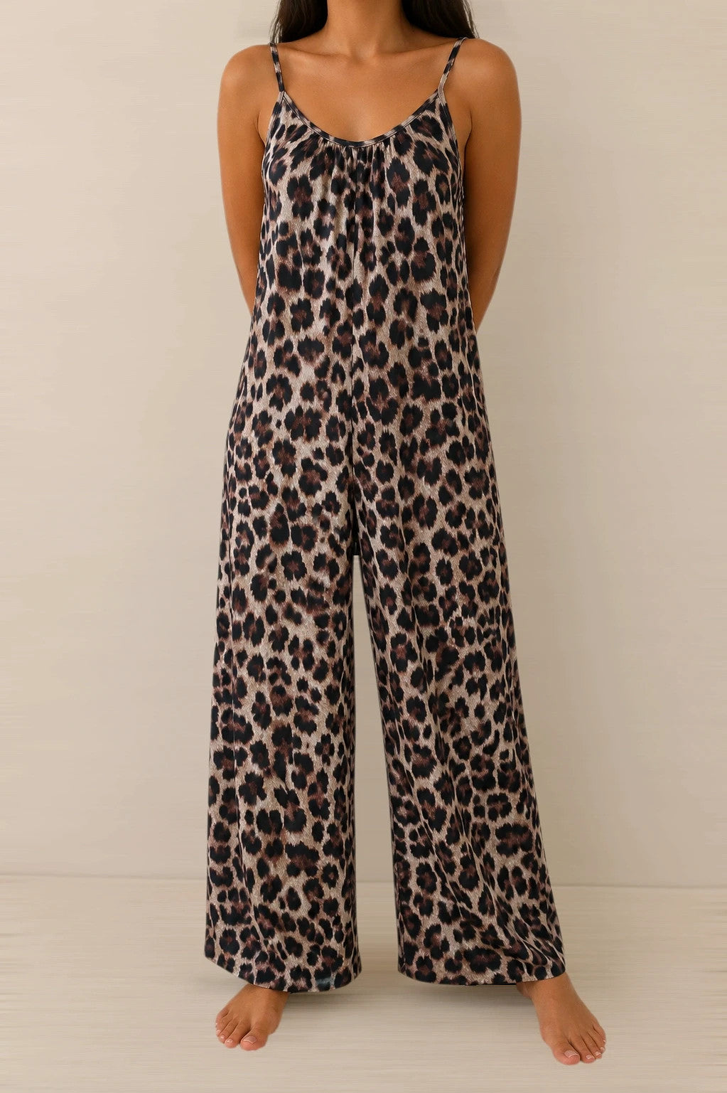 SheIn beige and brown jumpsuit with leopard print pattern and sleeveless design.