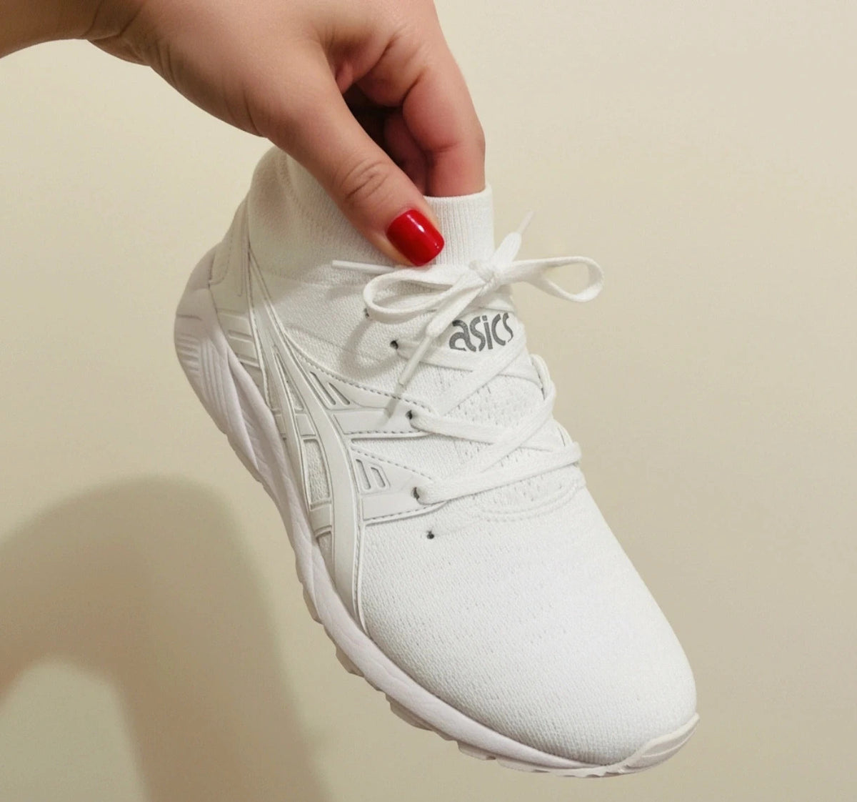 ASICS white trainers synthetic and textile material with classic design and logo.
