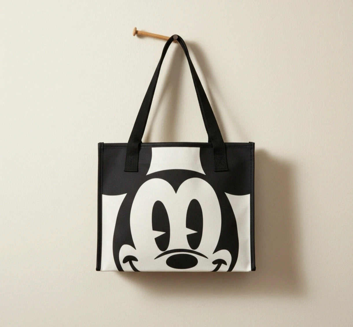 One Size black and cream shopping tote with zipper, synthetic and textile material.