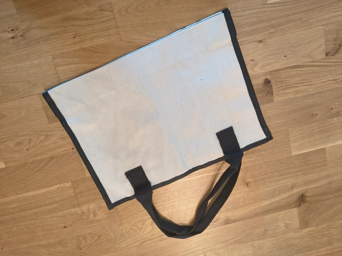 One Size black and cream shopping tote with zipper, synthetic and textile material.