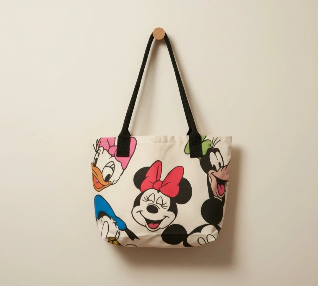 Kleine Tasche cream shopping tote with colorful cartoon comic print and sturdy handles.