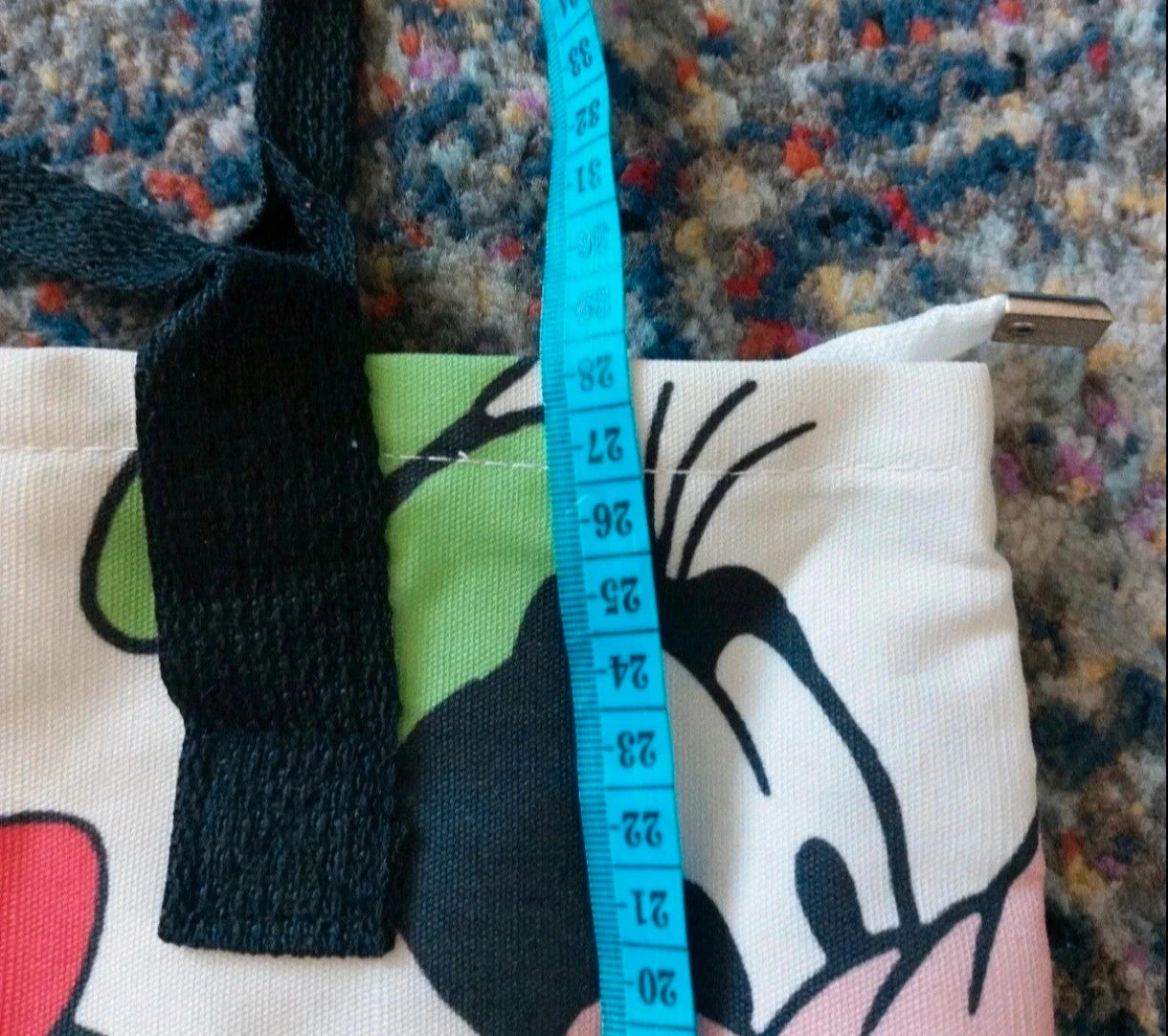 Kleine Tasche cream shopping tote with colorful cartoon comic print and sturdy handles.