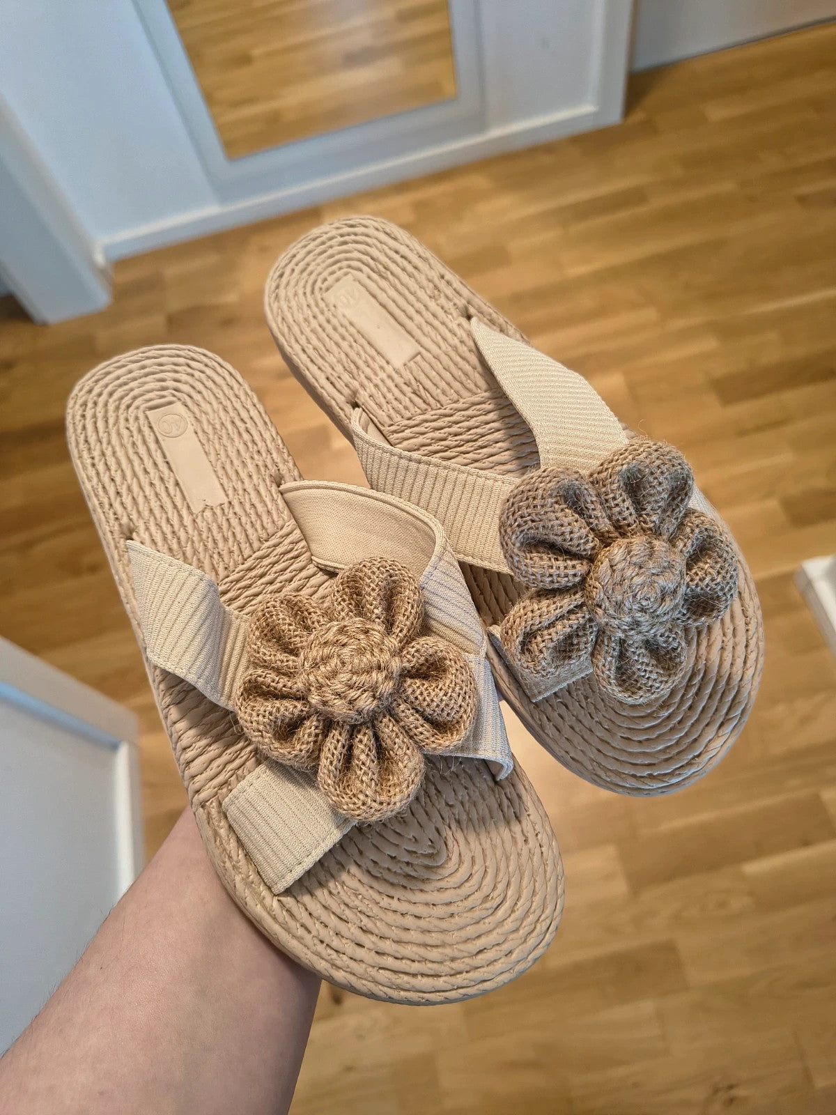 ALS beige slides synthetic material with subtle logo detailing.