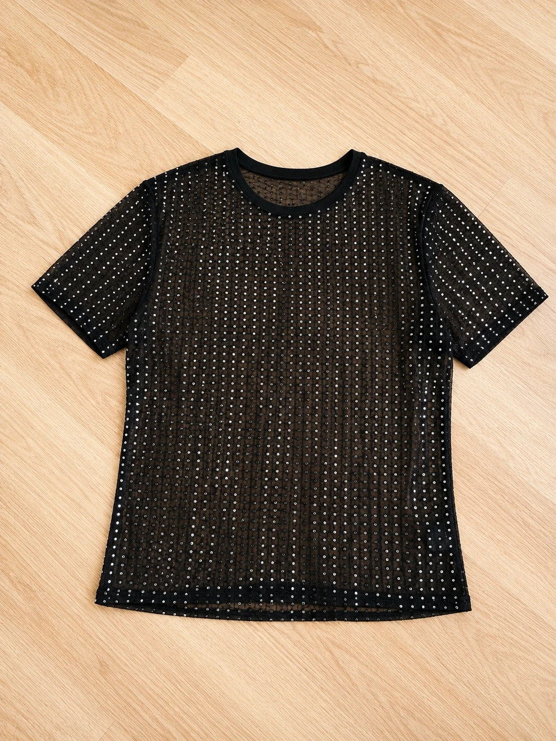 Herren black graphic tee with silver glitter details and semi-transparent mesh fabric.