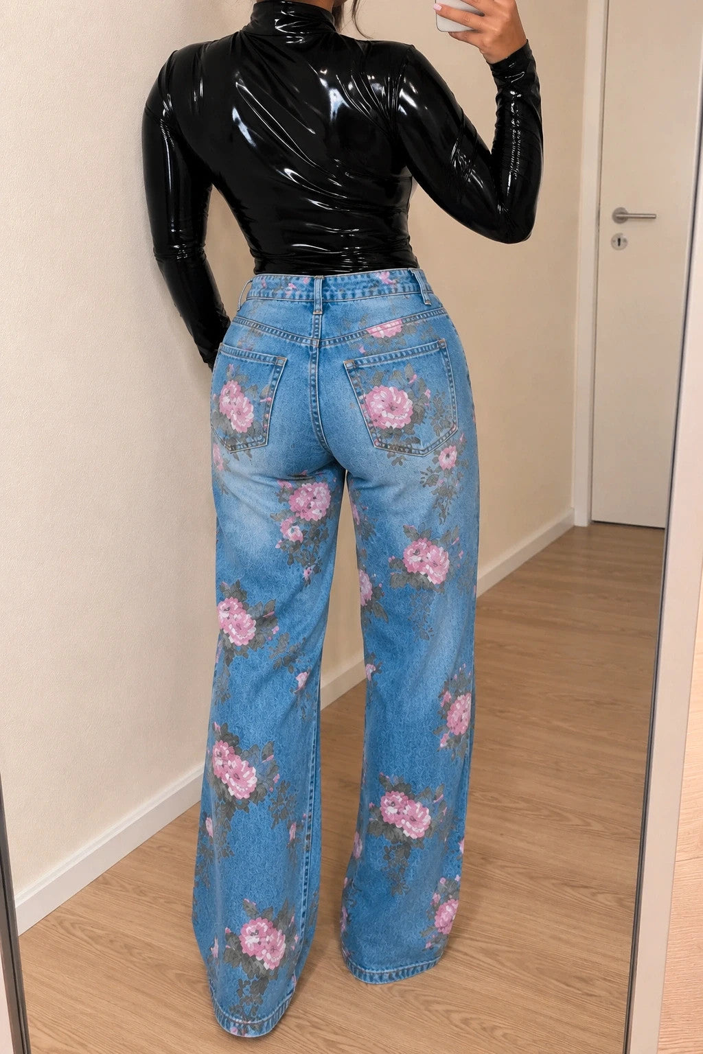 REI blue straight jeans with pink floral pattern and classic button closure.