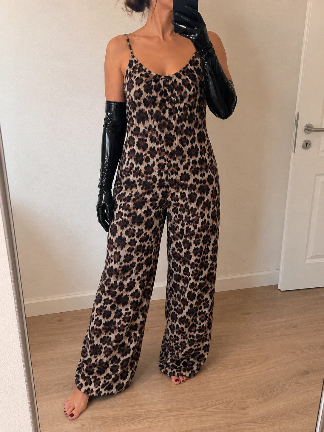 SheIn beige and brown leopard print jumpsuit with thin straps and wide legs.