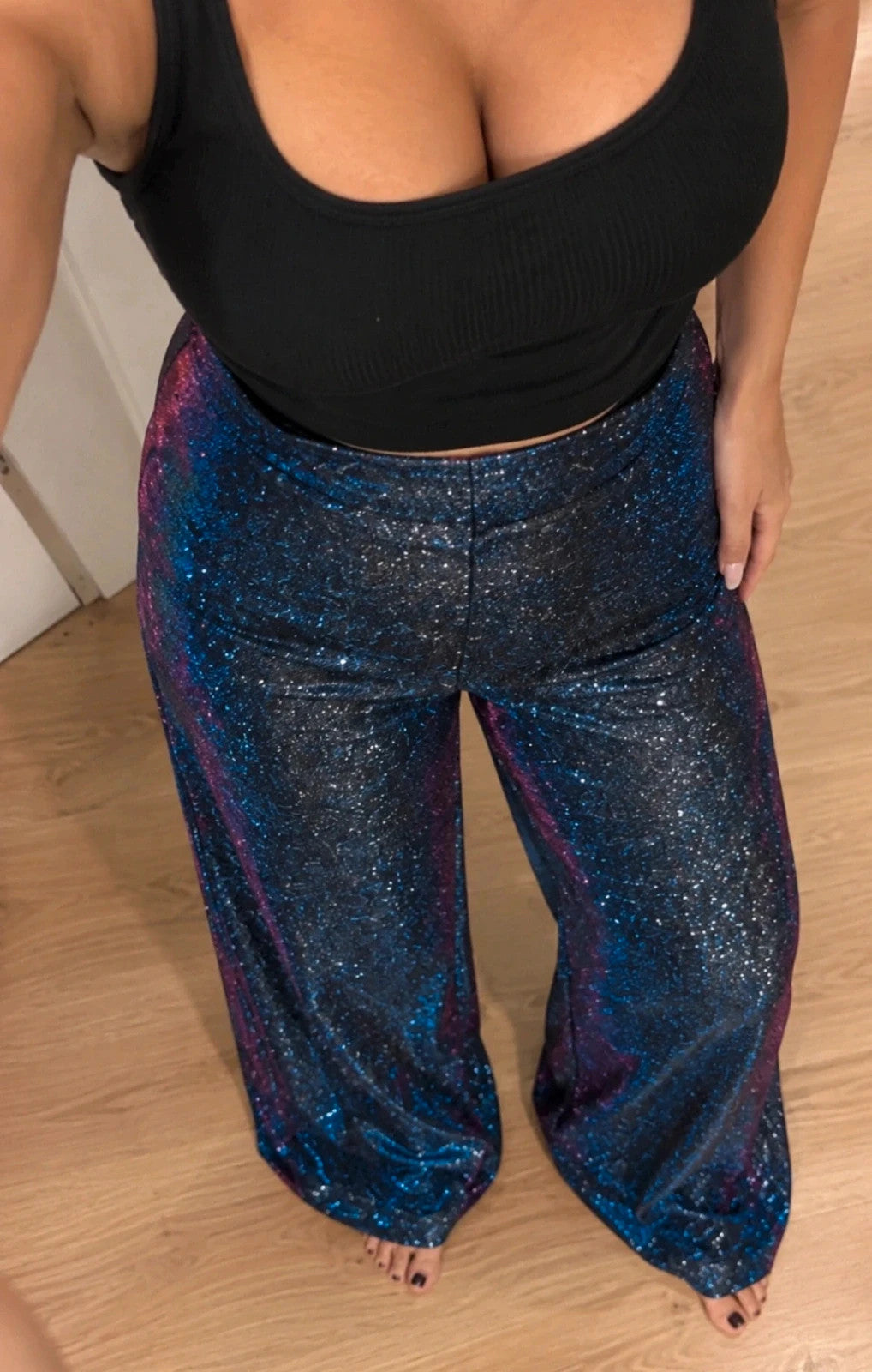 SheIn blue violet high waist glitter flared pants with shimmering color change effect.