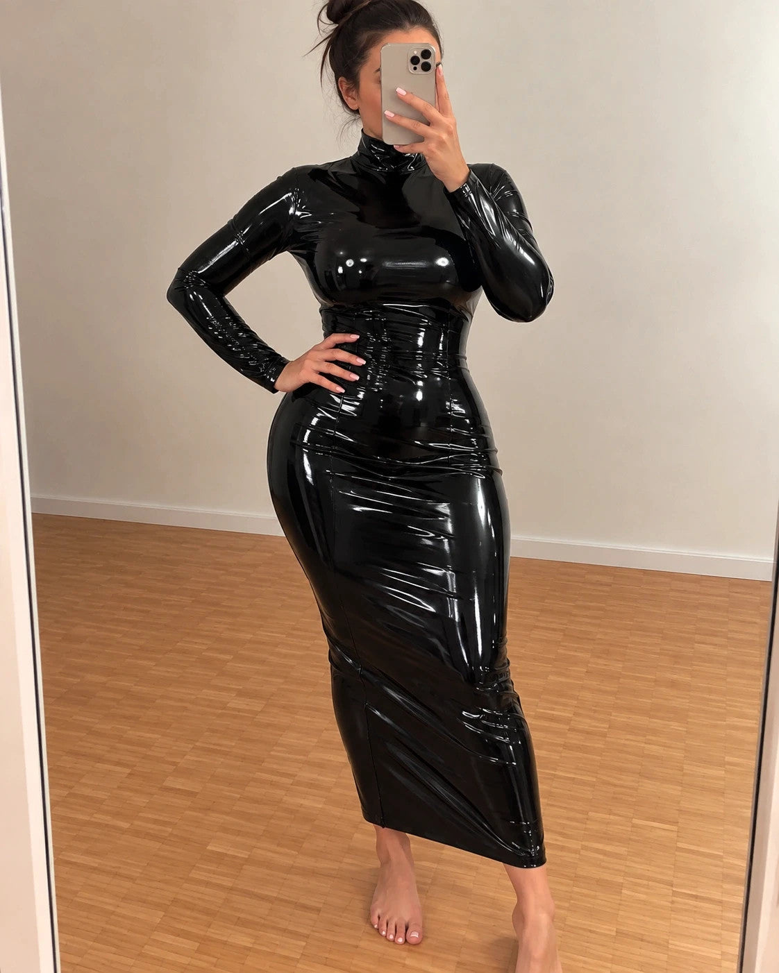 REI black bandage dress high neck long sleeve wetlook finish with back zipper.
