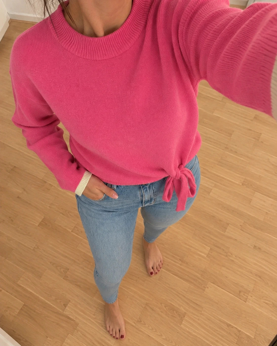 ONLY pink pullover with drawstring detail, round neckline, and contrasting sleeve cuffs.
