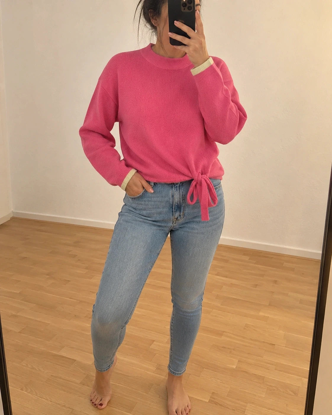 ONLY pink pullover with drawstring detail, round neckline, and contrasting sleeve cuffs.