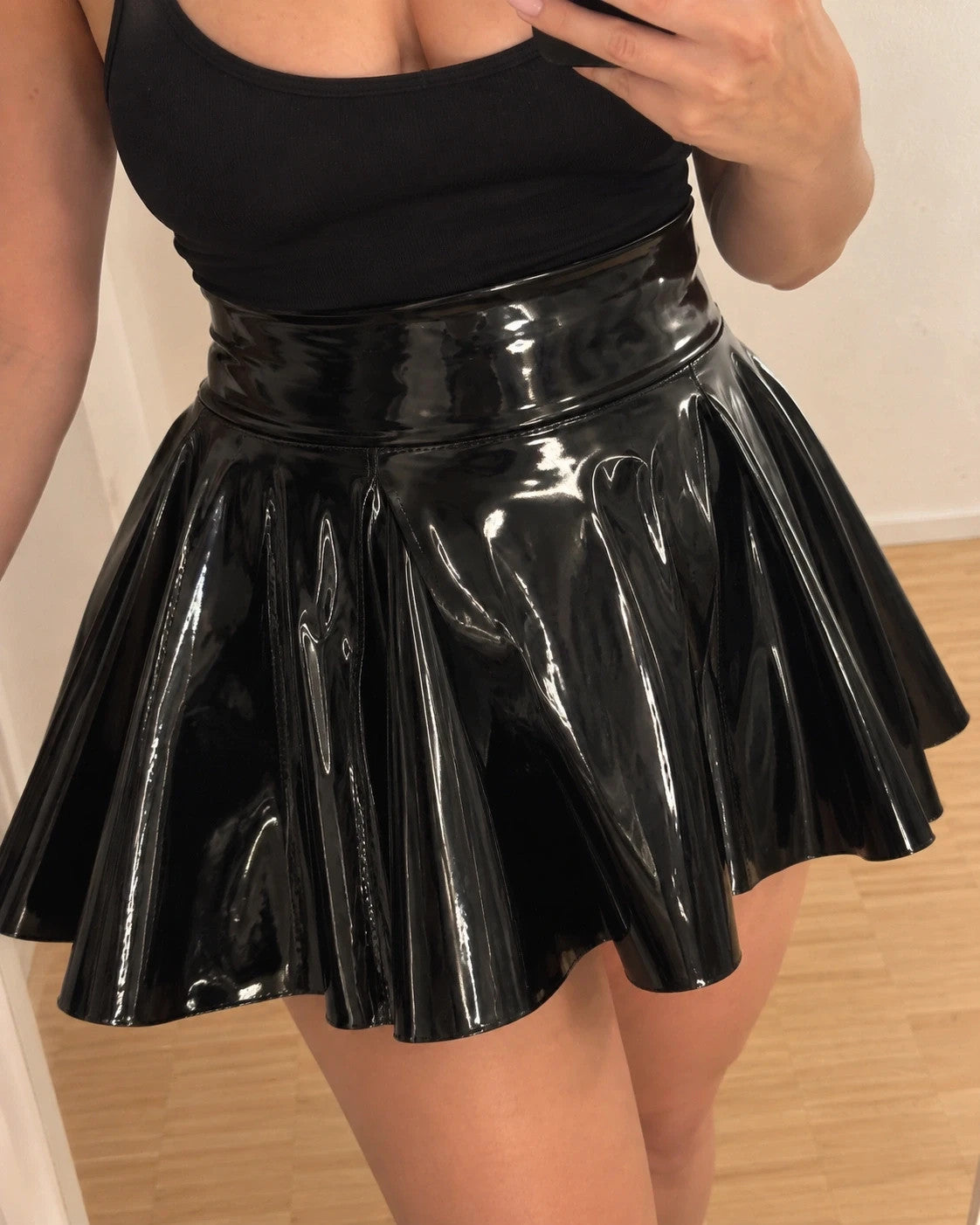 XXL black wetlook mini skirt high waist with back zipper and shiny finish