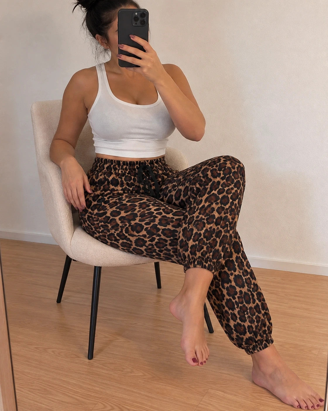 SheIn joggers black and brown leopard print, elastic waistband, lightweight synthetic material.