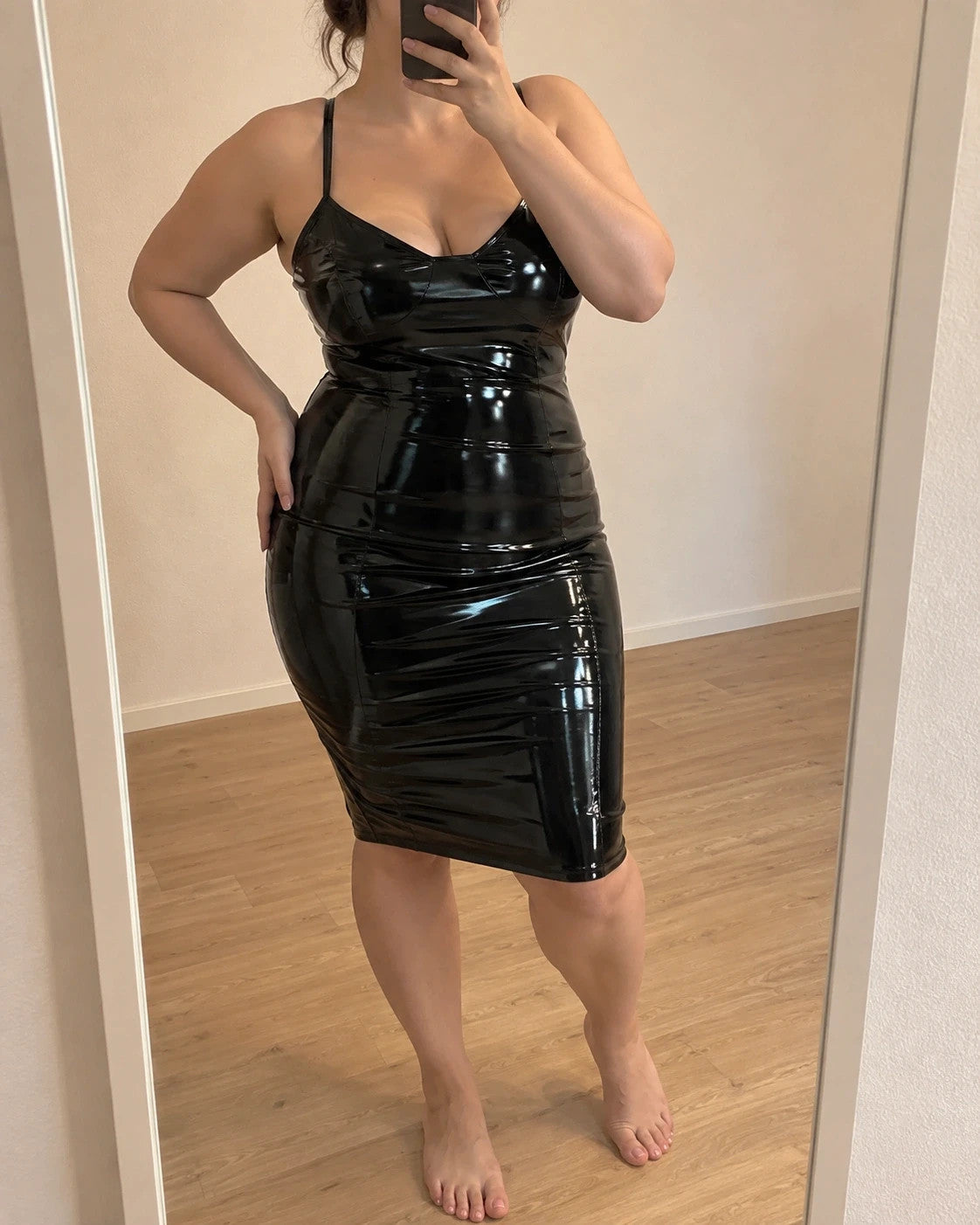 REI black midi dress with pockets, glossy wetlook finish and adjustable straps.