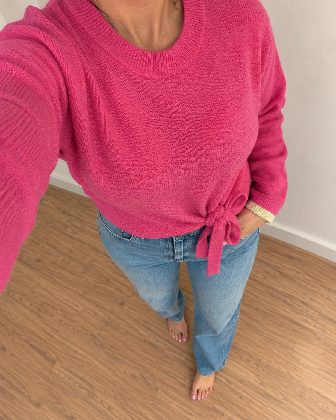ONLY pink oversized pullover with drawstring, soft material, and contrasting sleeve accents.