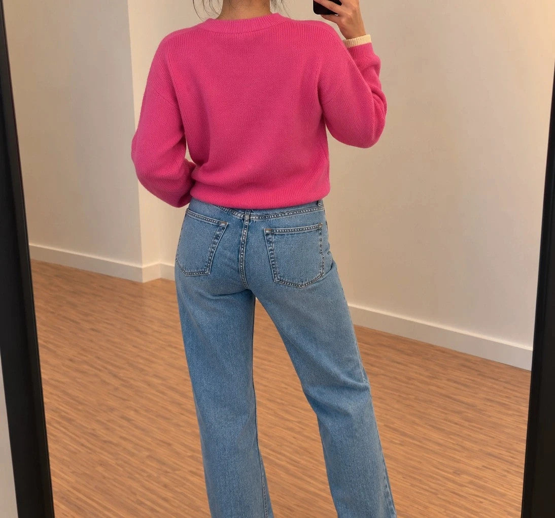ONLY pink oversized pullover with drawstring, soft material, and contrasting sleeve accents.