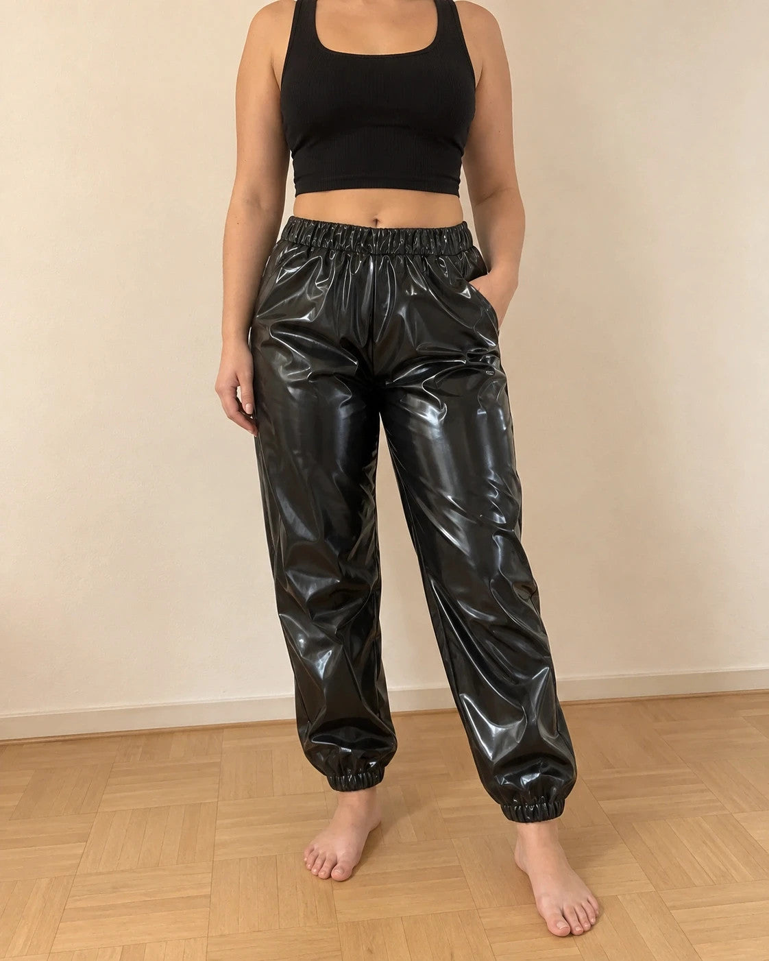 Che black joggers glossy finish elastic waistband relaxed fit