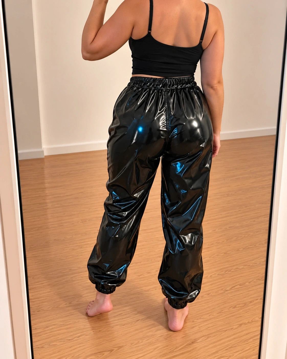 Bequem black joggers high-shine finish with elastic waistband and cuffs.