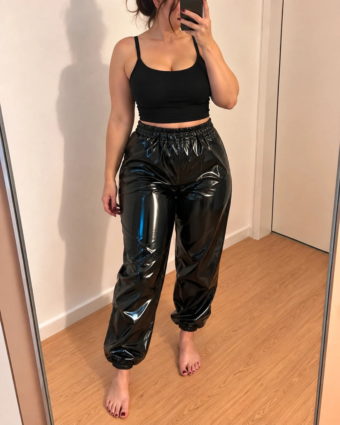 Bequem black joggers high-shine finish with elastic waistband and cuffs.