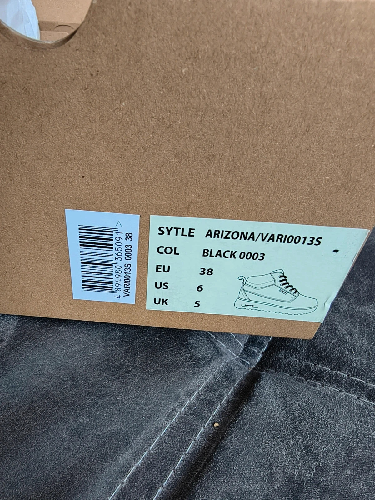 Levi's black and grey sneaker boots with logo details and padded high shaft.
