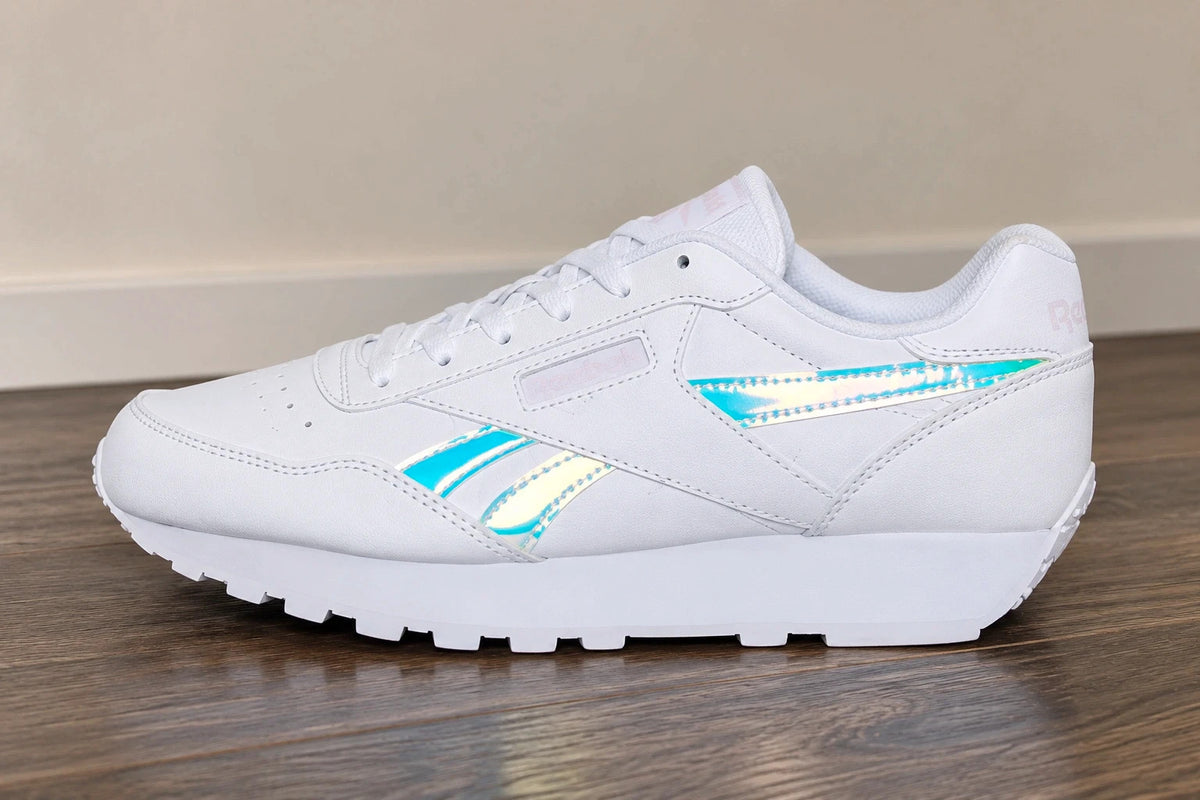 Reebok white trainers hologram details, synthetic material, classic logo design.