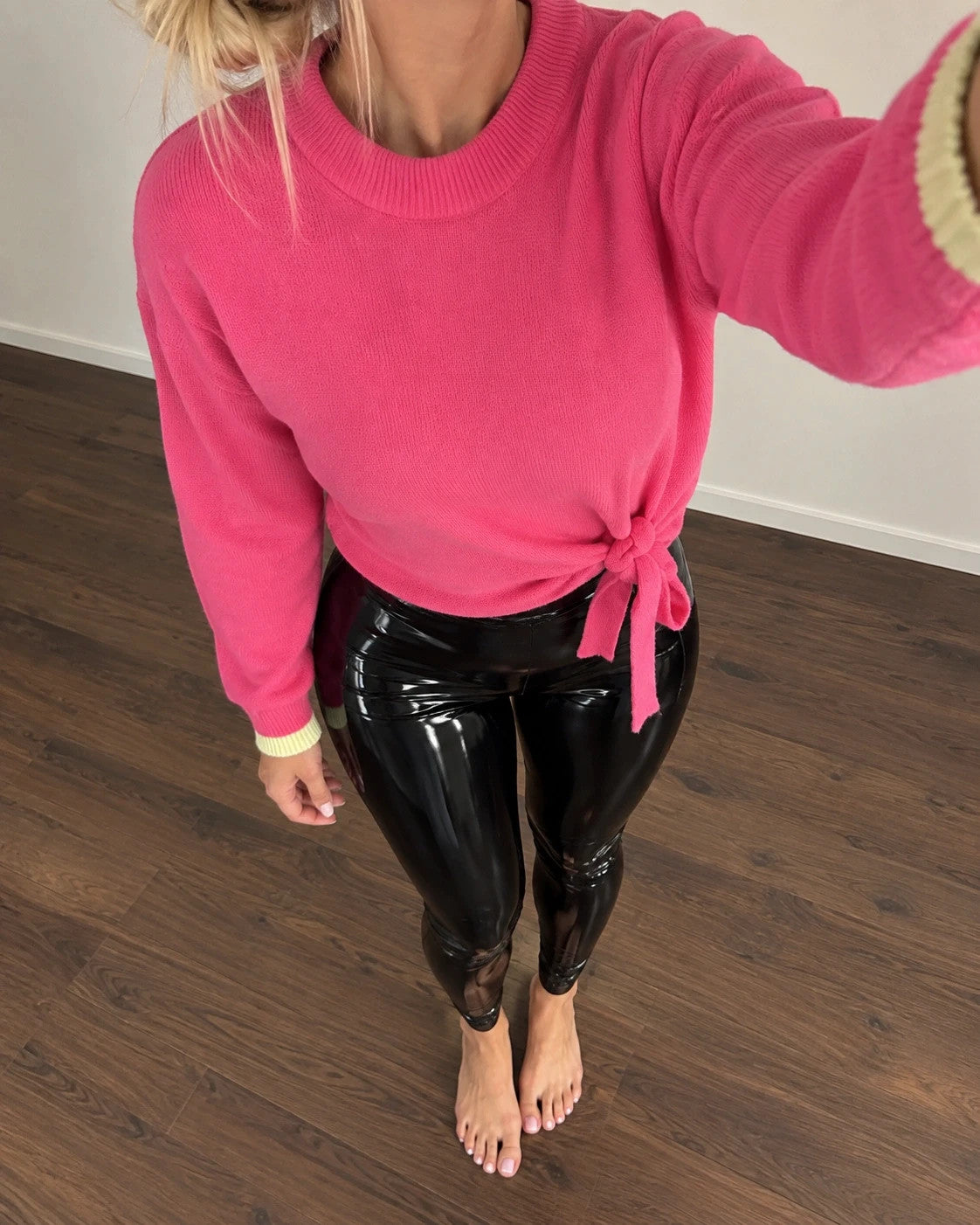 ONLY pink oversized pullover with side lacing and brand label detail.