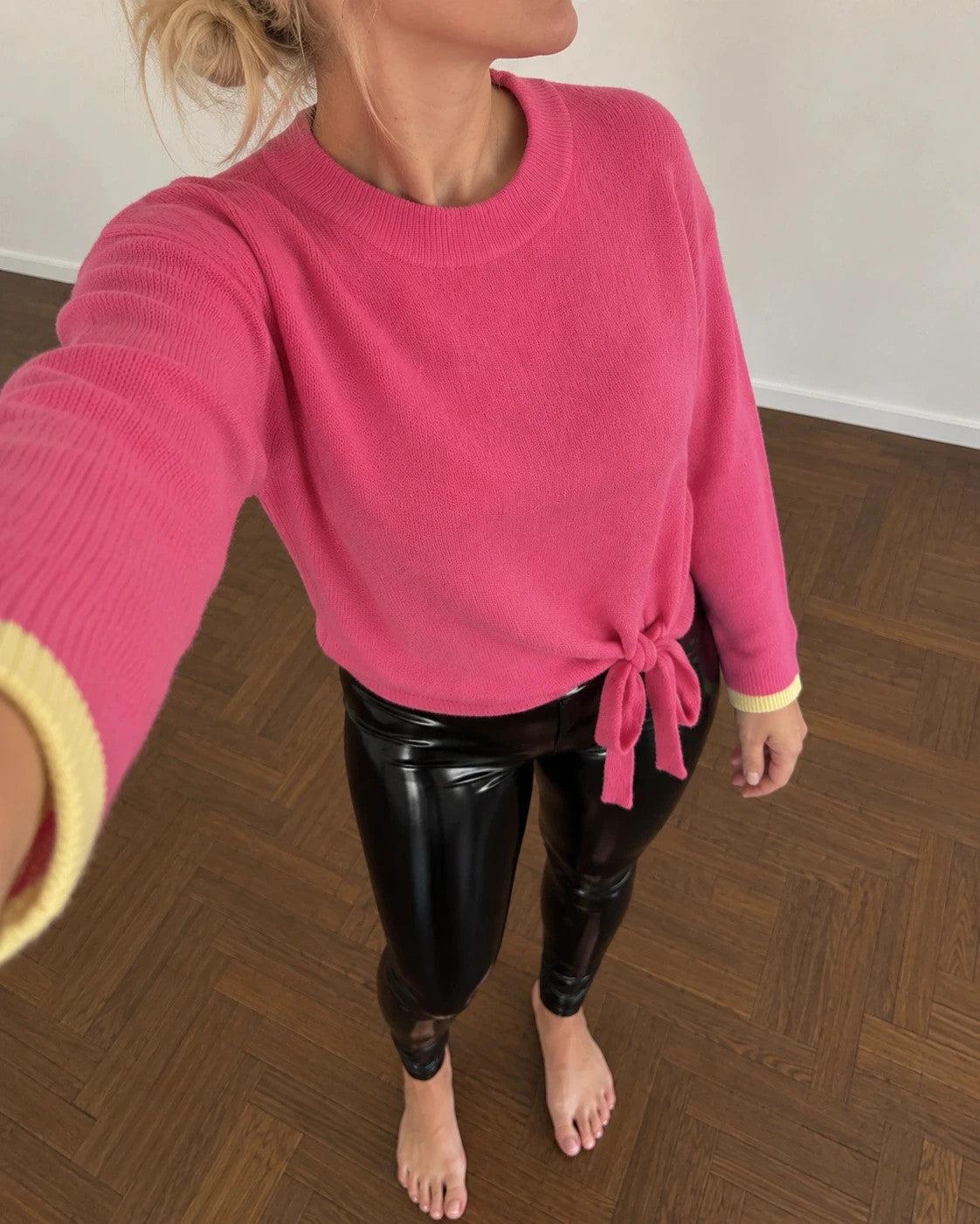 ONLY pink oversized pullover with side lacing and brand label detail.
