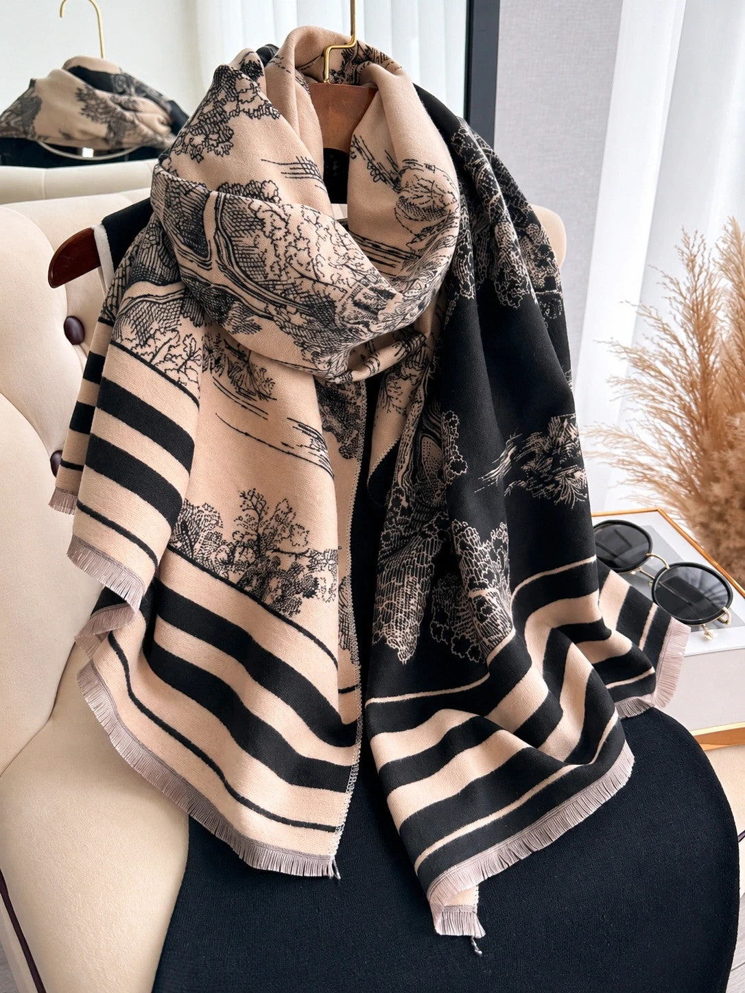 XXL beige and black reversible shawl with beautiful pattern and soft polyester material.