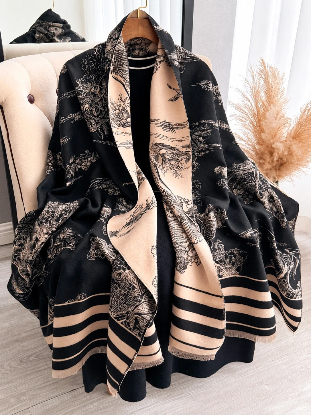 XXL beige and black reversible shawl with beautiful pattern and soft polyester material.
