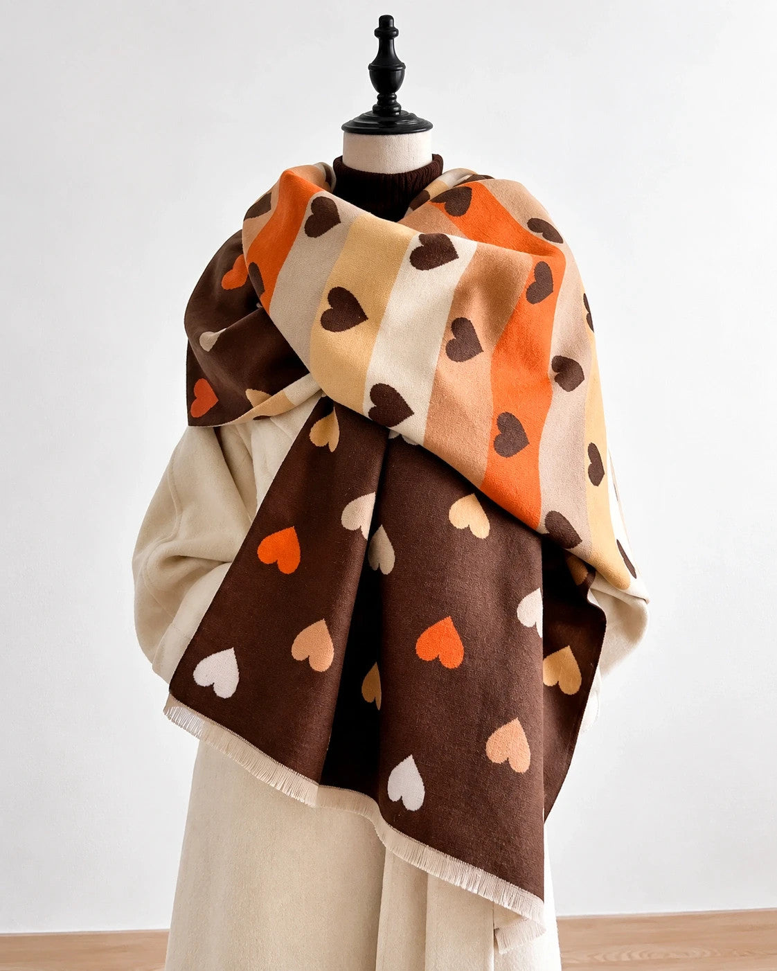 XXL brown shawl with heart pattern, reversible design in warm beige and orange tones.
