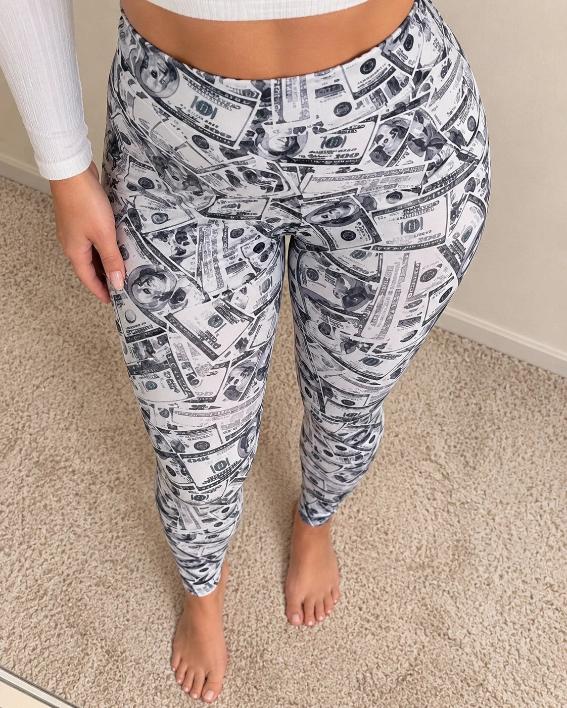 SheIn grey and white bicycle tights high-waisted with dollar bill print pattern.