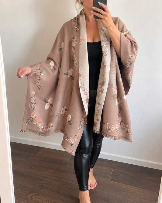 Braun reversible shawl in brown and cream with bee and flower patterns, 100% polyester.