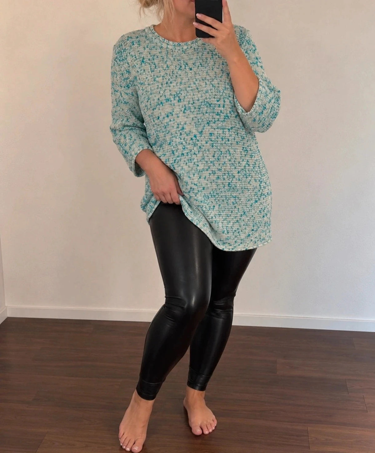 Bexleys long pullover turquoise and cream chunky knit with round neckline and relaxed fit.