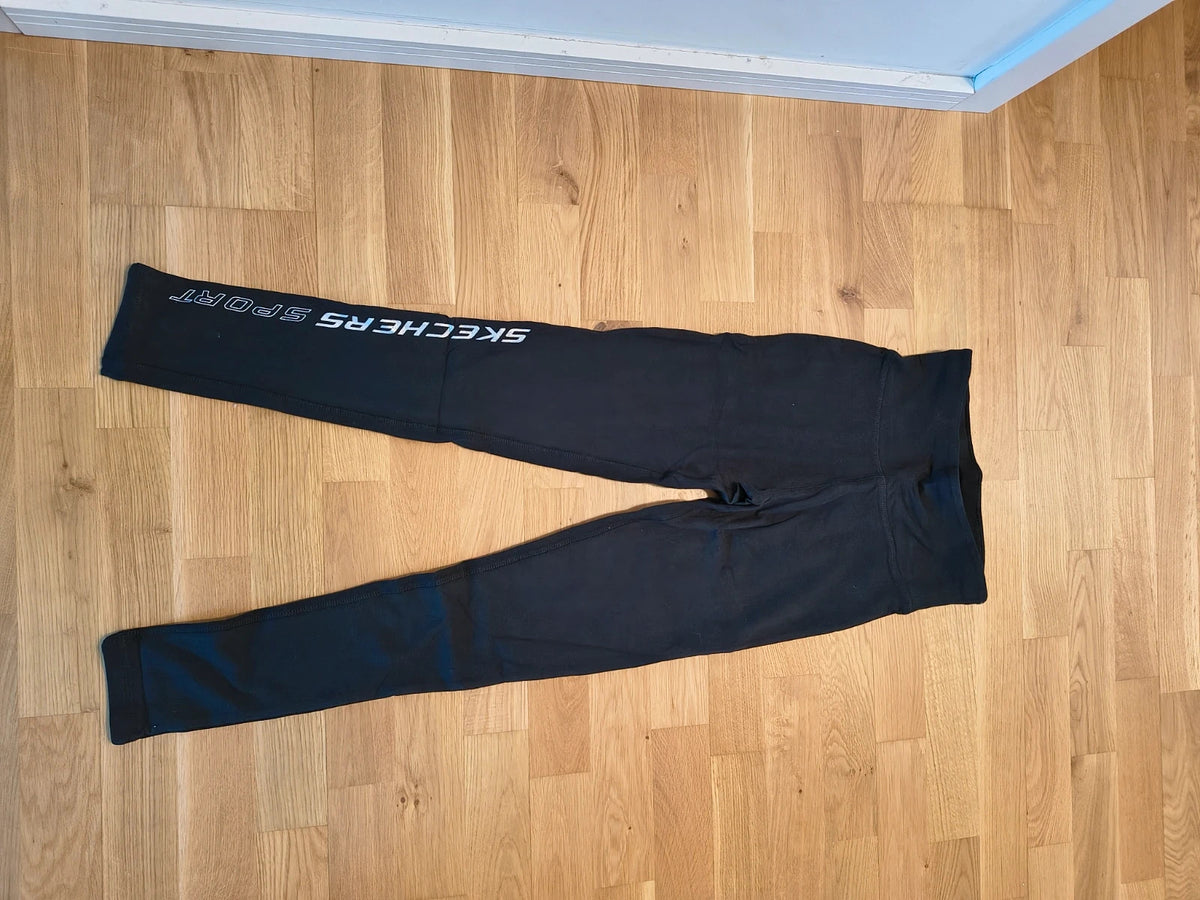 Skechers black bicycle tights high waist with matte finish and logo detail on leg.