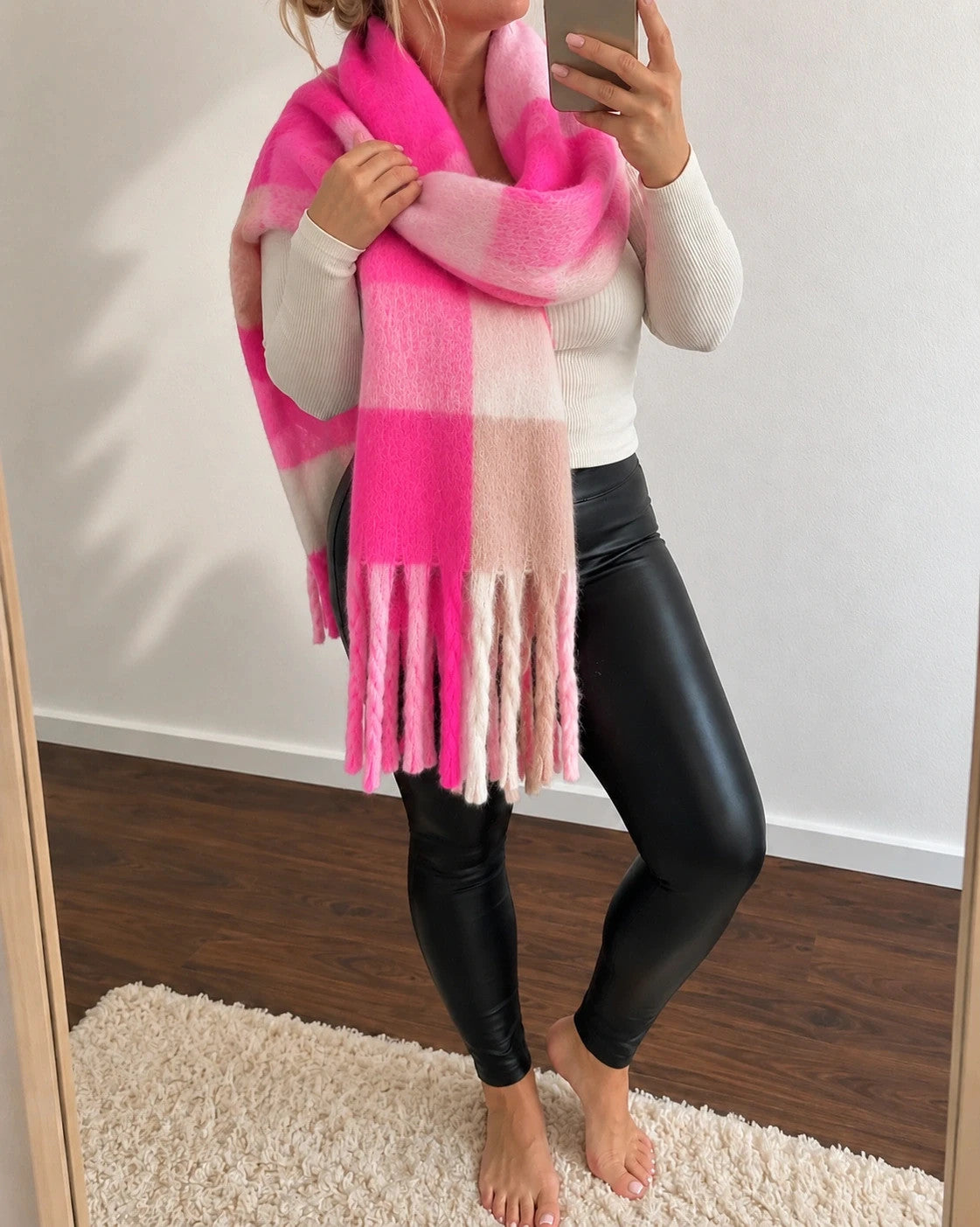 XXL oversized shawl in pink, cream, and beige with large check pattern and fringes.