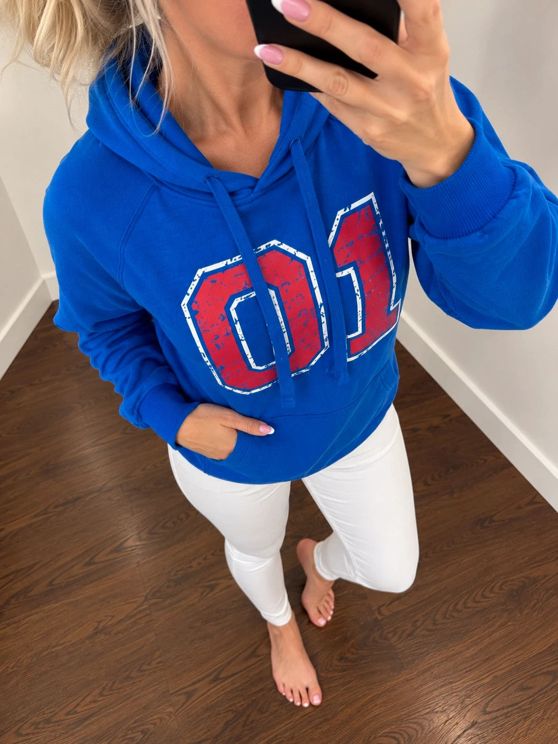 Shamp blue hoodie with large red and white 01 print, drawstring hood, kangaroo pocket.