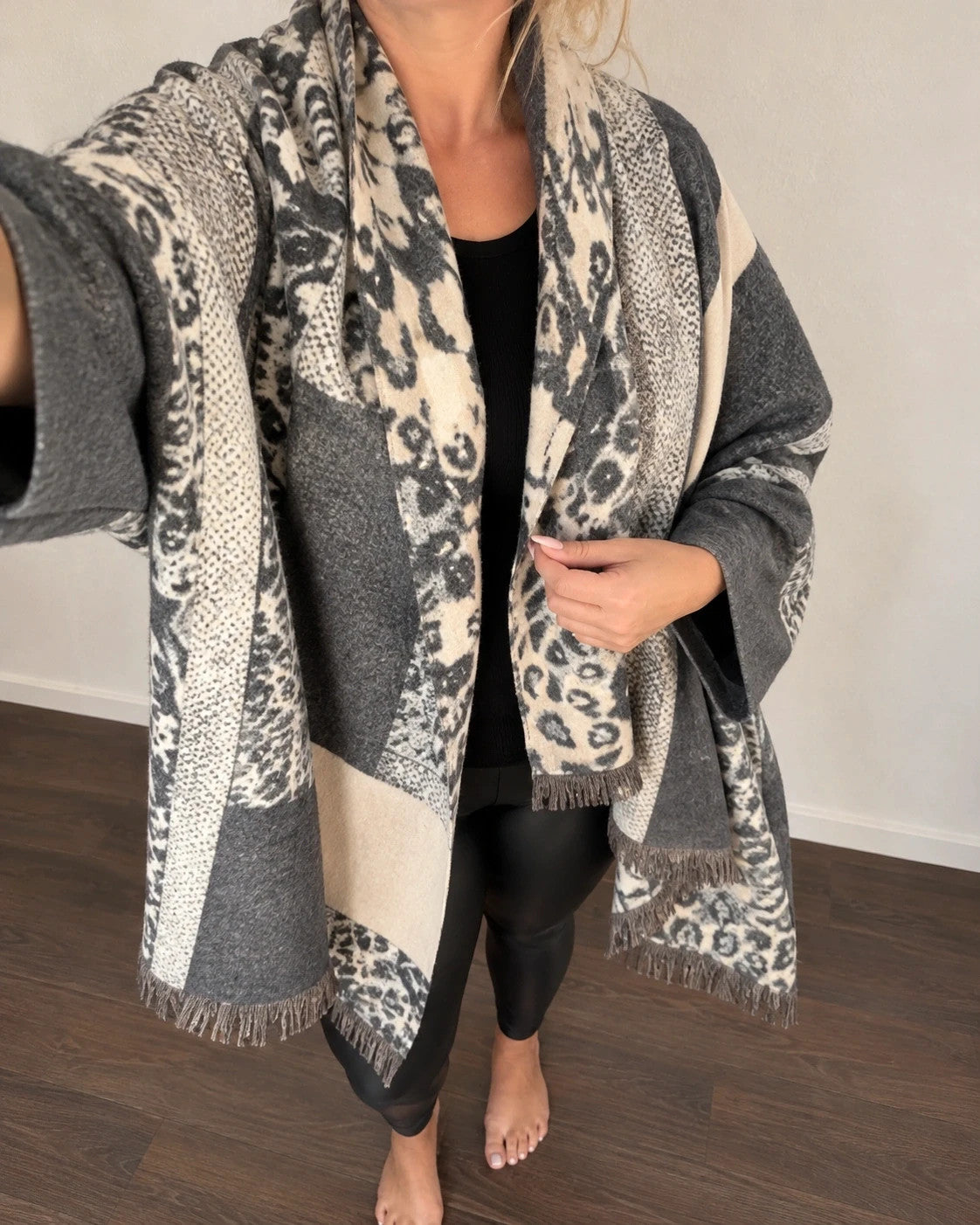 Creme reversible scarf grey and cream with leopard print and geometric patterns, fringed ends.