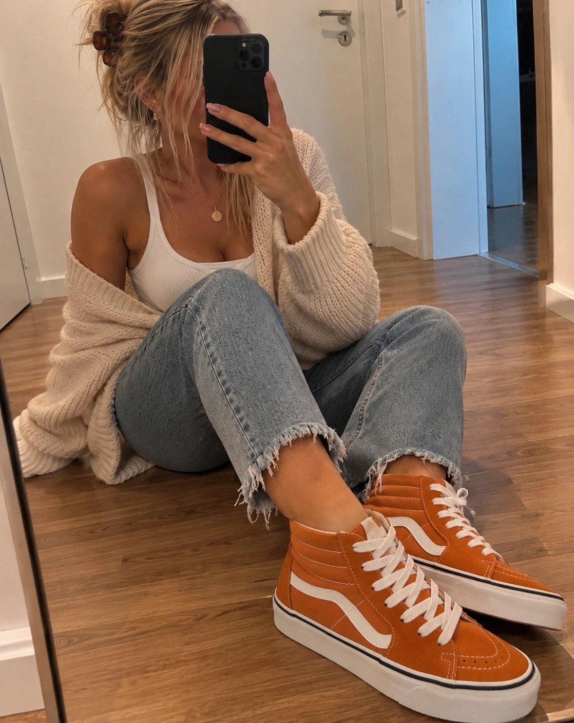 VANS Sk8-Hi Tapered trainers orange marmalade with white laces and signature side stripe.